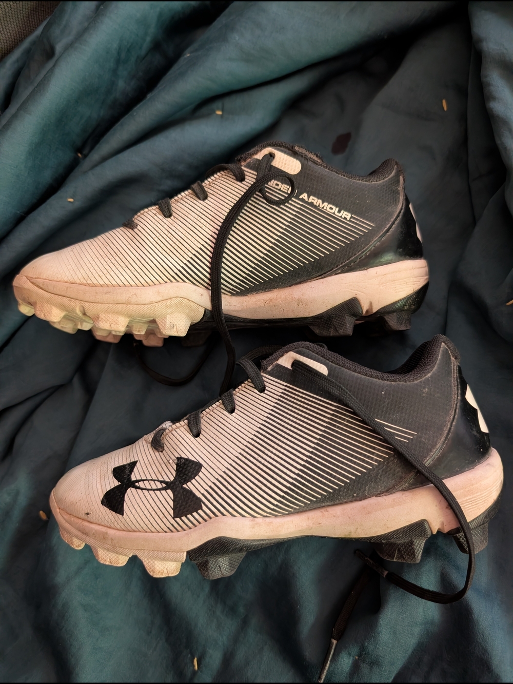 Under Armour Kids White and Black Athletic Cleats